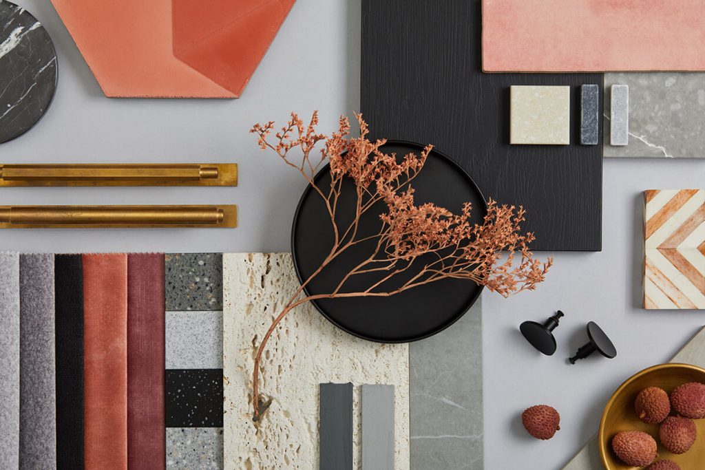 Samples of colored textiles and fabrics with pink, black and grey colors