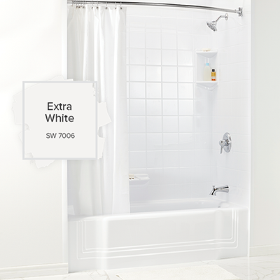 A classic white bathroom and bathtub